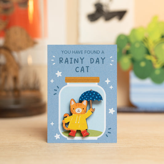 RAINY DAY CAT PIN/MAGNET
